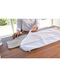 Tapis de repassage enroulable avec pattemouille amovible 2