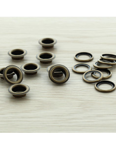 Sacchetto di 100 occhielli con rondelle 11 mm - Ottone antico