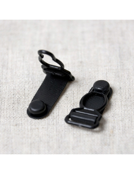 Set di 4 ganci per reggicalze in plastica - Nero