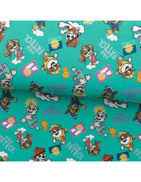 Tessuto jersey Paw Patrol - Sole su sfondo blu turchese