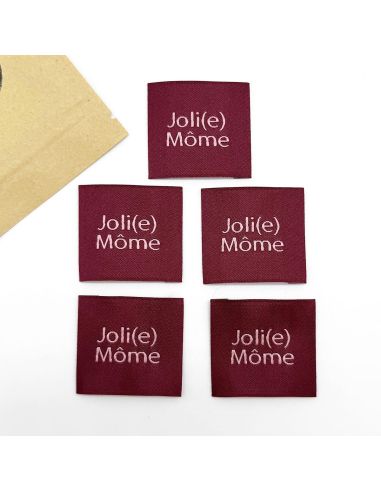 Set di 5 etichette tessute da cucire Joli Môme bordeaux