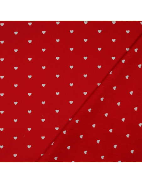 Tessuto popeline di cotone fantasia - Cuori bianchi su sfondo rosso